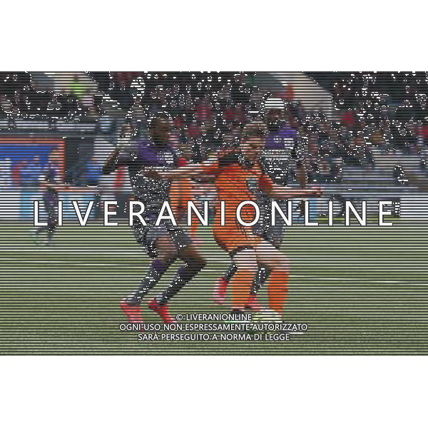 Benjamin JEANNOT / Jean Daniel AKPA AKPRO - 18.04.2015 - Lorient / Toulouse - 33eme journee de Ligue 1 Photo : Vincent Michel / Icon Sport /Agenzia Aldo Liverani sas - ITALY ONLY - EDITORIAL USE ONLY