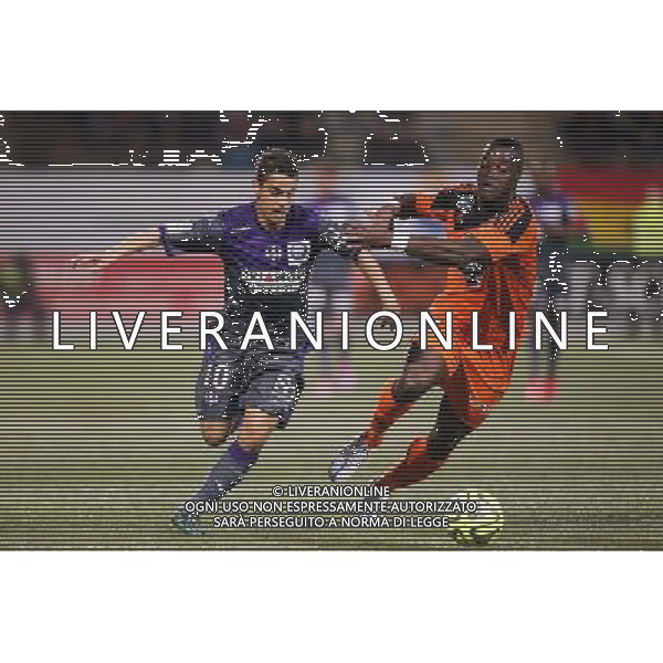Wissam BEN YEDDER / Lamine KONE - 18.04.2015 - Lorient / Toulouse - 33eme journee de Ligue 1 Photo : Vincent Michel / Icon Sport /Agenzia Aldo Liverani sas - ITALY ONLY - EDITORIAL USE ONLY