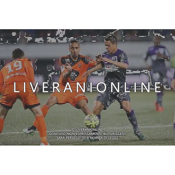 Wissam BEN YEDDER / Walid MESLOUB - 18.04.2015 - Lorient / Toulouse - 33eme journee de Ligue 1 Photo : Vincent Michel / Icon Sport /Agenzia Aldo Liverani sas - ITALY ONLY - EDITORIAL USE ONLY
