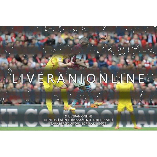 Aston Villa\'s Christian Benteke heads the ball Photographer Ian Cook/CameraSport Football - The FA Cup Semi-Final - Aston Villa v Liverpool - Sunday 19th April 2015 - Wembley - London © CameraSport - 43 Linden Ave. Countesthorpe. Leicester. England. LE8 5PG - Tel: +44 (0) 116 277 4147 - admin@camerasport.com - www.camerasport.com /Agenzia Aldo Liverani Sas - ITALY ONLY - EDITORIAL USE ONLY