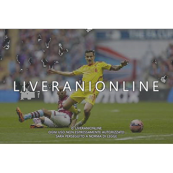 Liverpool\'s Philippe Coutinho is fouled by Aston Villa\'s Fabian Delph, for which he receives a yellow card Photographer Craig Mercer/CameraSport Football - The FA Cup Semi-Final - Aston Villa v Liverpool - Sunday 19th April 2015 - Wembley - London © CameraSport - 43 Linden Ave. Countesthorpe. Leicester. England. LE8 5PG - Tel: +44 (0) 116 277 4147 - admin@camerasport.com - www.camerasport.com /Agenzia Aldo Liverani Sas - ITALY ONLY - EDITORIAL USE ONLY