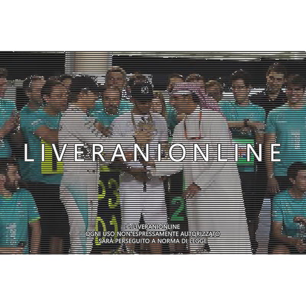 Third placed Nico Rosberg (GER) Mercedes AMG F1 and race winner Lewis Hamilton (GBR) Mercedes AMG F1 celebrate with the team. 19.04.2015. Formula 1 World Championship, Rd 4, Bahrain Grand Prix, Sakhir, Bahrain, Race Day. AG ALDO LIVERANI SAS ONLY ITALY