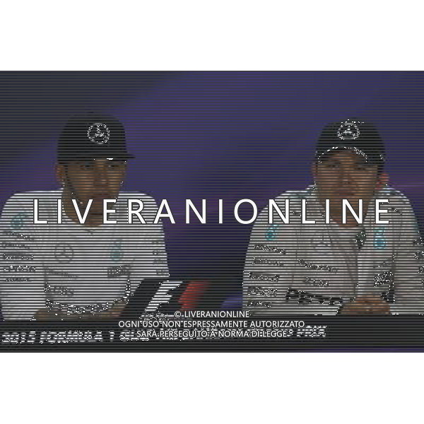 (L to R): Lewis Hamilton (GBR) Mercedes AMG F1 with team mate Nico Rosberg (GER) Mercedes AMG F1 in the FIA Press Conference. 19.04.2015. Formula 1 World Championship, Rd 4, Bahrain Grand Prix, Sakhir, Bahrain, Race Day. AG ALDO LIVERANI SAS ONLY ITALY