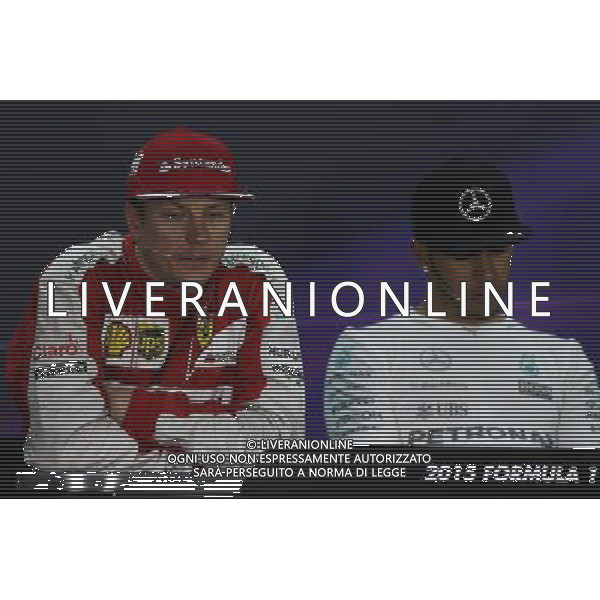 (L to R): Kimi Raikkonen (FIN) Ferrari and Lewis Hamilton (GBR) Mercedes AMG F1 in the post race FIA Press Conference. 19.04.2015. Formula 1 World Championship, Rd 4, Bahrain Grand Prix, Sakhir, Bahrain, Race Day. AG ALDO LIVERANI SAS ONLY ITALY