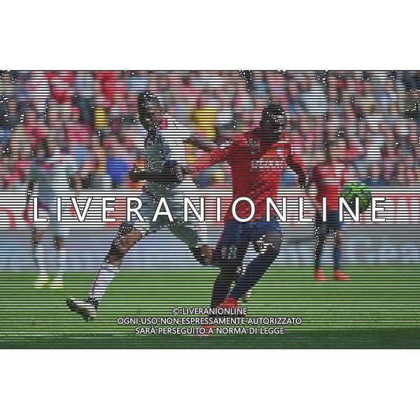Andre BIYOGO POKO / Adama TRAORE - 19.04.2015 - Lille / Bordeaux - 33eme journee de Ligue 1 Photo : Dave Winter / Icon Sport AG ALDO LIVERANI SAS ONLY ITALY