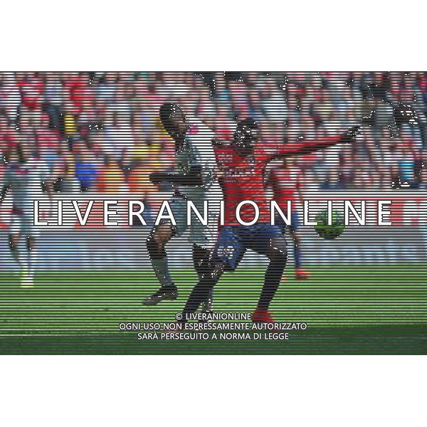Andre BIYOGO POKO / Adama TRAORE - 19.04.2015 - Lille / Bordeaux - 33eme journee de Ligue 1 Photo : Dave Winter / Icon Sport AG ALDO LIVERANI SAS ONLY ITALY