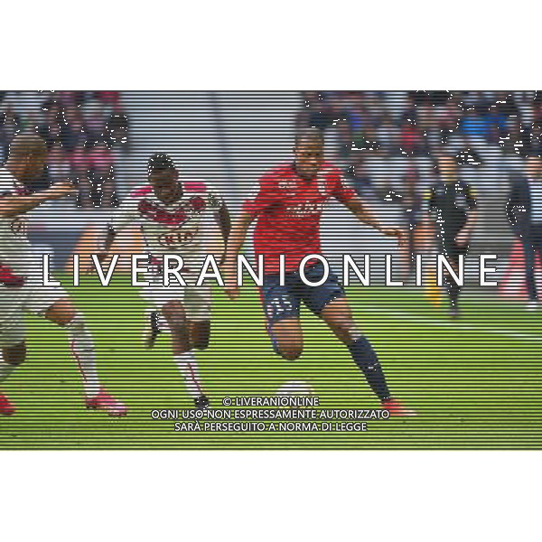 Djibril SIDIBE / Andre BIYOGO POKO - 19.04.2015 - Lille / Bordeaux - 33eme journee de Ligue 1 Photo : Dave Winter / Icon Sport AG ALDO LIVERANI SAS ONLY ITALY