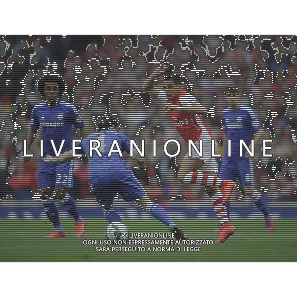 Arsenal\'s Alexis Sanchez battles with Chelsea\'s Cesc Fabregas Photographer Ashley Western/CameraSport Football - Barclays Premiership - Arsenal v Chelsea - Sunday 26th April 2015 - Emirates Stadium - London © CameraSport - 43 Linden Ave. Countesthorpe. Leicester. England. LE8 5PG - Tel: +44 (0) 116 277 4147 - admin@camerasport.com - www.camerasport.com /Agenzia Aldo Liverani Sas - ITALY ONLY - EDITORIAL USE ONLY