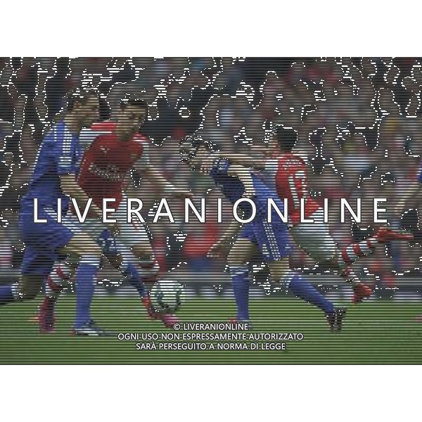 Arsenal\'s Alexis Sanchez battles with Chelsea\'s Cesc Fabregas Photographer Ashley Western/CameraSport Football - Barclays Premiership - Arsenal v Chelsea - Sunday 26th April 2015 - Emirates Stadium - London © CameraSport - 43 Linden Ave. Countesthorpe. Leicester. England. LE8 5PG - Tel: +44 (0) 116 277 4147 - admin@camerasport.com - www.camerasport.com /Agenzia Aldo Liverani Sas - ITALY ONLY - EDITORIAL USE ONLY