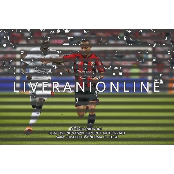 Dennis Appiah / Eric Bautheac - 02.05.2015 - Nice / Caen - 35eme journee de Ligue 1 Photo : Sebastien Nogier / Icon Sport AG ALDO LIVERANI SAS ONLY ITALY