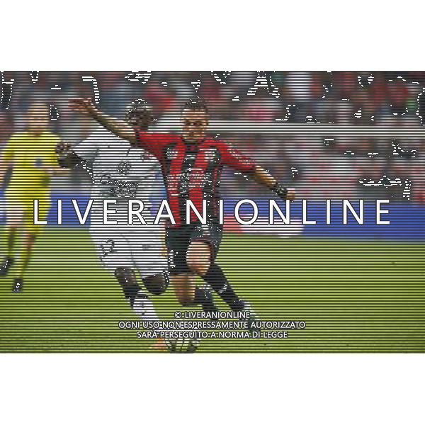Dennis Appiah / Eric Bautheac - 02.05.2015 - Nice / Caen - 35eme journee de Ligue 1 Photo : Sebastien Nogier / Icon Sport AG ALDO LIVERANI SAS ONLY ITALY