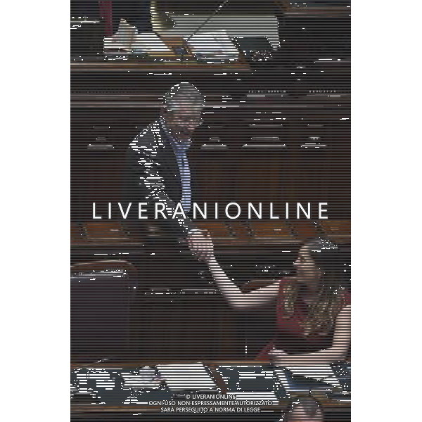 Roma - 04/05/2015 - Montecitorio - Voto di fiducia sulla legge elettorale Italicum nella foto ELENA BOSCHI CON UMBERTO BOSSI foto fabrizio corradetti-ag aldo liverani sas