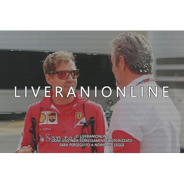 (L to R): Sebastian Vettel (GER) Ferrari with Maurizio Arrivabene (ITA) Ferrari Team Principal. 07.05.2015. Formula 1 World Championship, Rd 5, Spanish Grand Prix, Barcelona, Spain, Preparation Day. /AGENZIA ALDO LIVERANI SAS - ITALY ONLY - EDITORIAL USE ONLY - Gp f1 Barcellona Spagna - preparativi
