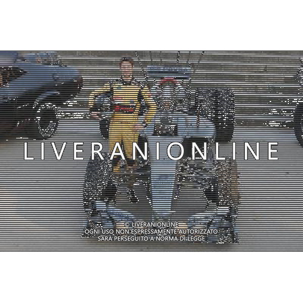 Romain Grosjean (FRA) Lotus F1 Team with special race overalls and car livery to promote the film Mad Max: Fury Road. 08.05.2015. Formula 1 World Championship, Rd 5, Spanish Grand Prix, Barcelona, Spain, Practice Day. AG ALDO LIVERANI SAS ONLY ITALY