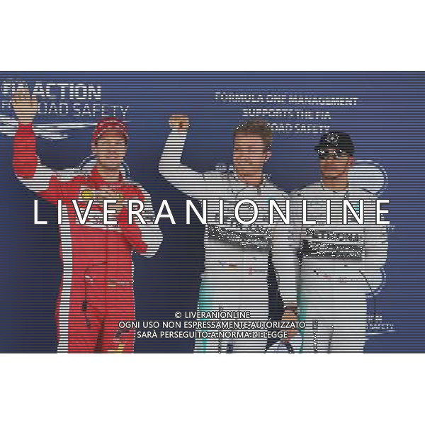 Qualifying top three in parc ferme (L to R): Sebastian Vettel (GER) Ferrari, third; Nico Rosberg (GER) Mercedes AMG F1, pole position; Lewis Hamilton (GBR) Mercedes AMG F1, second. 09.05.2015. Formula 1 World Championship, Rd 5, Spanish Grand Prix, Barcelona, Spain, Qualifying Day. AG ALDO LIVERANI SAS ONLY ITALY