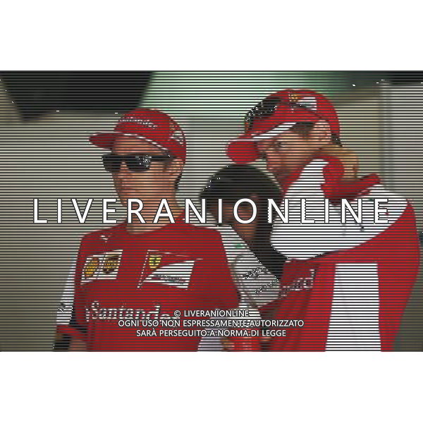 (L to R): Kimi Raikkonen (FIN) Ferrari with team mate Sebastian Vettel (GER) Ferrari on the drivers parade. 10.05.2015. Formula 1 World Championship, Rd 5, Spanish Grand Prix, Barcelona, Spain, Race Day. AG ALDO LIVERANI SAS ONLY ITALY