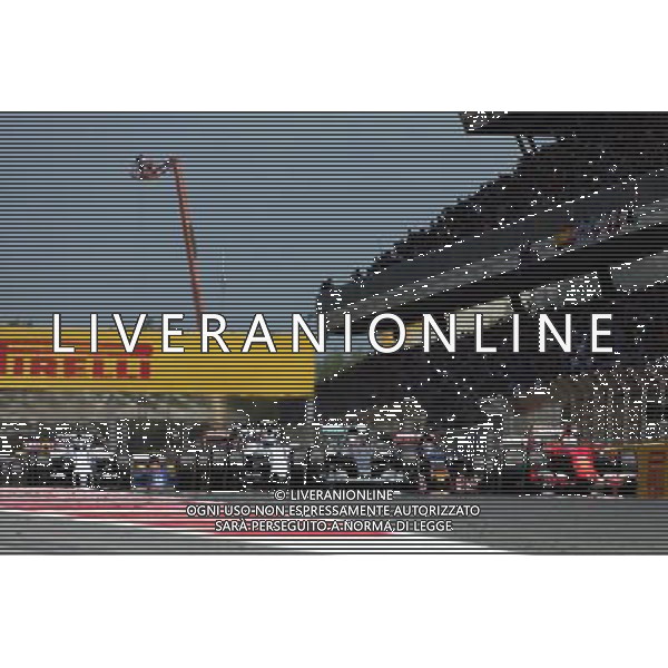 Lewis Hamilton (GBR) Mercedes AMG F1 W06 and Sebastian Vettel (GER) Ferrari SF15-T at the start of the race. 10.05.2015. Formula 1 World Championship, Rd 5, Spanish Grand Prix, Barcelona, Spain, Race Day. AG ALDO LIVERANI SAS ONLY ITALY