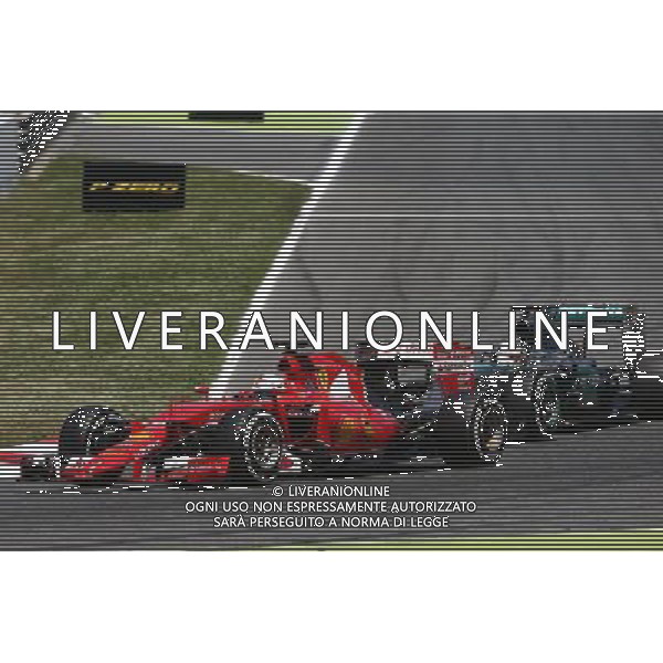 Sebastian Vettel (GER) Ferrari SF15-T and Lewis Hamilton (GBR) Mercedes AMG F1 W06 battle for position. 10.05.2015. Formula 1 World Championship, Rd 5, Spanish Grand Prix, Barcelona, Spain, Race Day. AG ALDO LIVERANI SAS ONLY ITALY