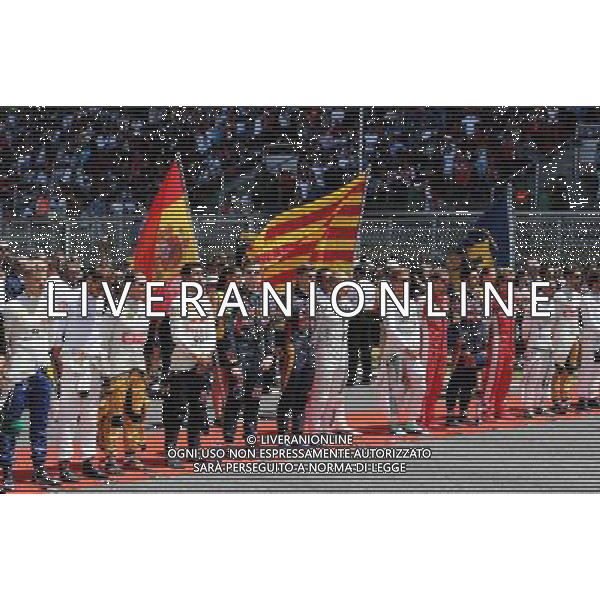 The drivers on the grid observe the national anthem. 10.05.2015. Formula 1 World Championship, Rd 5, Spanish Grand Prix, Barcelona, Spain, Race Day. AG ALDO LIVERANI SAS ONLY ITALY