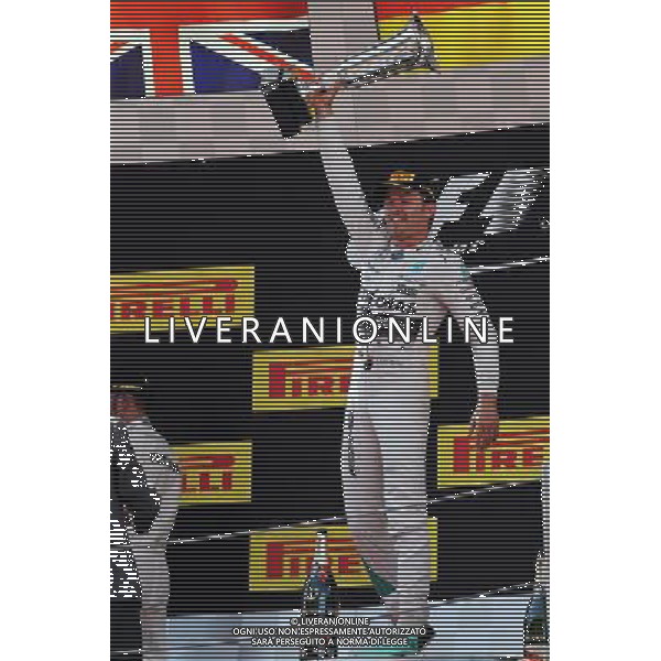 race winner Nico Rosberg (GER) Mercedes AMG F1 celebrates on the podium. 10.05.2015. Formula 1 World Championship, Rd 5, Spanish Grand Prix, Barcelona, Spain, Race Day. AG ALDO LIVERANI SAS ONLY ITALY