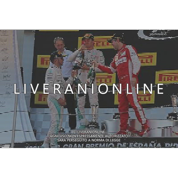 The podium (L to R): Lewis Hamilton (GBR) Mercedes AMG F1, second; Nico Rosberg (GER) Mercedes AMG F1, race winner; Sebastian Vettel (GER) Ferrari, third. 10.05.2015. Formula 1 World Championship, Rd 5, Spanish Grand Prix, Barcelona, Spain, Race Day. AG ALDO LIVERANI SAS ONLY ITALY