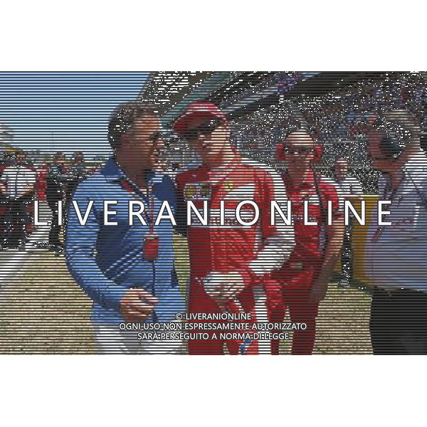 (L to R): Jean Alesi (FRA) with Kimi Raikkonen (FIN) Ferrari on the grid. 10.05.2015. Formula 1 World Championship, Rd 5, Spanish Grand Prix, Barcelona, Spain, Race Day. AG ALDO LIVERANI SAS ONLY ITALY