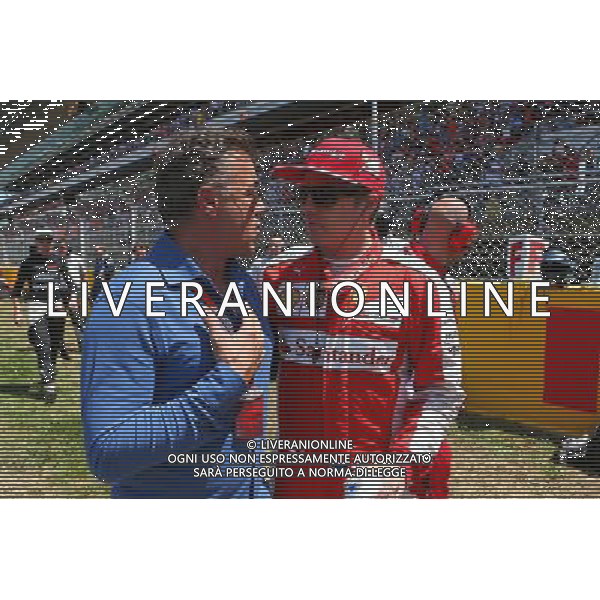 (L to R): Jean Alesi (FRA) with Kimi Raikkonen (FIN) Ferrari on the grid. 10.05.2015. Formula 1 World Championship, Rd 5, Spanish Grand Prix, Barcelona, Spain, Race Day. AG ALDO LIVERANI SAS ONLY ITALY