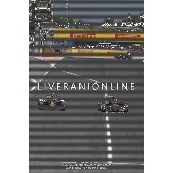 Daniil Kvyat (RUS) Red Bull Racing RB11 and Max Verstappen (NLD) Scuderia Toro Rosso STR10 battle for position. 10.05.2015. Formula 1 World Championship, Rd 5, Spanish Grand Prix, Barcelona, Spain, Race Day. AG ALDO LIVERANI SAS ONLY ITALY