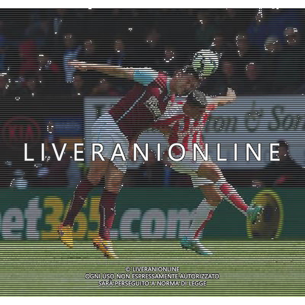 Burnley\'s Jason Shackell vies for possession with Stoke City\'s Jonathan Walters Photographer Chris Vaughan/CameraSport Football - Barclays Premiership - Burnley v Stoke City - Saturday 16th May 2015 - Turf Moor - Burnley © CameraSport - 43 Linden Ave. Countesthorpe. Leicester. England. LE8 5PG - Tel: +44 (0) 116 277 4147 - admin@camerasport.com - www.camerasport.com AG ALDO LIVERANI SAS ONLY ITALY