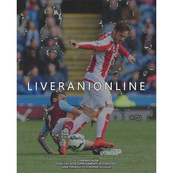 Stoke City\'s Marko Arnautovic is tackled by Burnley\'s Kieran Trippier Photographer Chris Vaughan/CameraSport Football - Barclays Premiership - Burnley v Stoke City - Saturday 16th May 2015 - Turf Moor - Burnley © CameraSport - 43 Linden Ave. Countesthorpe. Leicester. England. LE8 5PG - Tel: +44 (0) 116 277 4147 - admin@camerasport.com - www.camerasport.com AG ALDO LIVERANI SAS ONLY ITALY