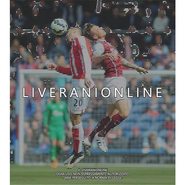 Stoke City\'s Geoff Cameron wins a header against Burnley\'s Matthew Taylor Photographer Andrew Vaughan/CameraSport Football - Barclays Premiership - Burnley v Stoke City - Saturday 16th May 2015 - Turf Moor - Burnley © CameraSport - 43 Linden Ave. Countesthorpe. Leicester. England. LE8 5PG - Tel: +44 (0) 116 277 4147 - admin@camerasport.com - www.camerasport.com AG ALDO LIVERANI SAS ONLY ITALY