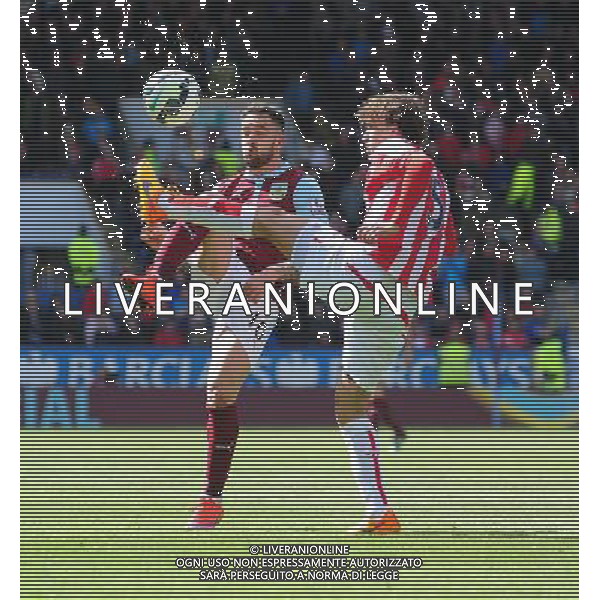 Burnley\'s Danny Ings vies for possession with Stoke City\'s Marc Muniesa Photographer Chris Vaughan/CameraSport Football - Barclays Premiership - Burnley v Stoke City - Saturday 16th May 2015 - Turf Moor - Burnley Â¬Â© CameraSport - 43 Linden Ave. Countesthorpe. Leicester. England. LE8 5PG - Tel: +44 (0) 116 277 4147 - admin@camerasport.com - www.camerasport.com AG ALDO LIVERANI SAS ONLY ITALY
