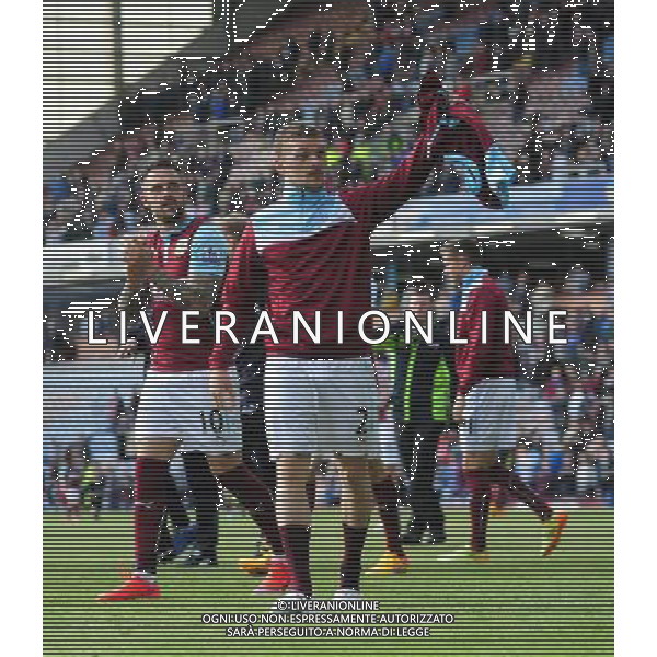 Burnley\'s Kieran Trippier goes to throw his shirt to a Burnley fan as team-mate Burnley\'s Danny Ings applauds the fans Photographer Chris Vaughan/CameraSport Football - Barclays Premiership - Burnley v Stoke City - Saturday 16th May 2015 - Turf Moor - Burnley Â¬Â© CameraSport - 43 Linden Ave. Countesthorpe. Leicester. England. LE8 5PG - Tel: +44 (0) 116 277 4147 - admin@camerasport.com - www.camerasport.com AG ALDO LIVERANI SAS ONLY ITALY