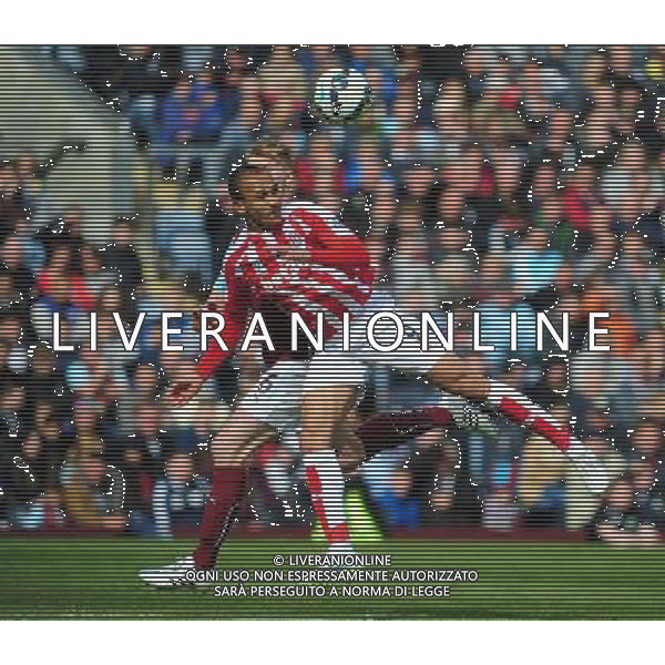 Stoke City\'s Peter Odemwingie gets to a header under pressure from Burnley\'s Ben Mee Photographer Andrew Vaughan/CameraSport Football - Barclays Premiership - Burnley v Stoke City - Saturday 16th May 2015 - Turf Moor - Burnley Â© CameraSport - 43 Linden Ave. Countesthorpe. Leicester. England. LE8 5PG - Tel: +44 (0) 116 277 4147 - admin@camerasport.com - www.camerasport.com AG ALDO LIVERANI SAS ONLY ITALY