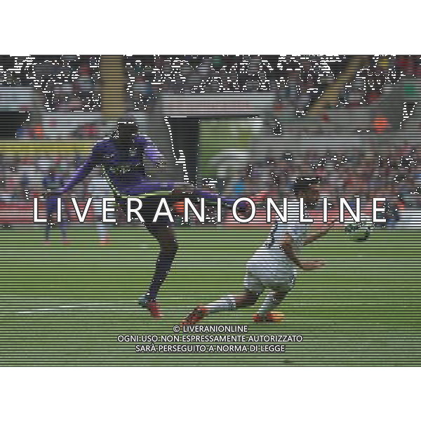 Manchester City\'s Yaya Toure has a shot on goal blocked by Swansea City\'s Neil Taylor Photographer Ashley Crowden/CameraSport Football - Barclays Premiership - Swansea City v Manchester City - Sunday 17th May 2015 - Liberty Stadium - Swansea © CameraSport - 43 Linden Ave. Countesthorpe. Leicester. England. LE8 5PG - Tel: +44 (0) 116 277 4147 - admin@camerasport.com - www.camerasport.com AG ALDO LIVERANI SAS ONLY ITALY
