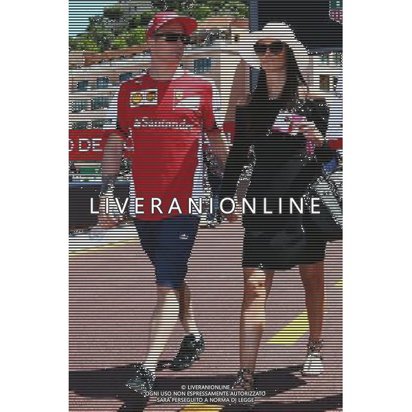 (L to R): Kimi Raikkonen (FIN) Ferrari with his girlfriend Minttu Virtanen (FIN). 22.05.2015. Formula 1 World Championship, Rd 6, Monaco Grand Prix, Monte Carlo, Monaco, Friday. AG ALDO LIVERANI SAS ONLY ITALY
