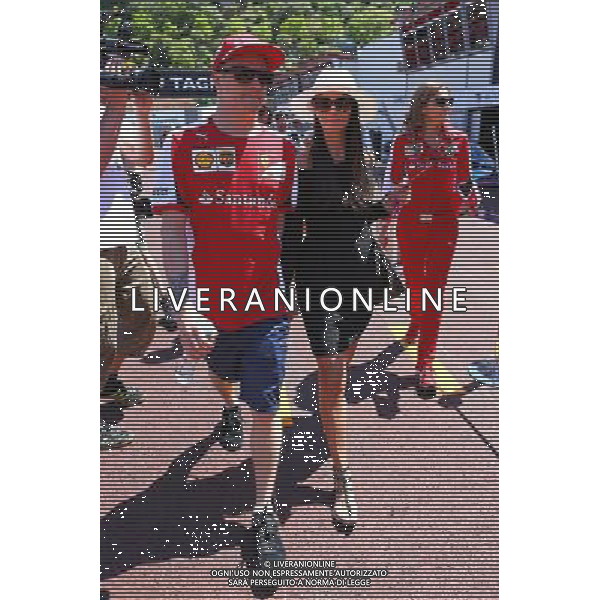 (L to R): Kimi Raikkonen (FIN) Ferrari with his girlfriend Minttu Virtanen (FIN). 22.05.2015. Formula 1 World Championship, Rd 6, Monaco Grand Prix, Monte Carlo, Monaco, Friday. AG ALDO LIVERANI SAS ONLY ITALY