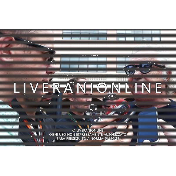 Flavio Briatore (ITA) (Right) with Jonathan Noble (GBR) Motorsport.com Journalist. 24.05.2015. Formula 1 World Championship, Rd 6, Monaco Grand Prix, Monte Carlo, Monaco, Race Day. AG ALDO LIVERANI SAS ONLY ITALY