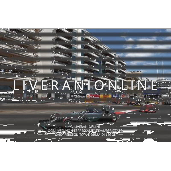 Nico Rosberg (GER) Mercedes AMG F1 W06 leads Sebastian Vettel (GER) Ferrari. 24.05.2015. Formula 1 World Championship, Rd 6, Monaco Grand Prix, Monte Carlo, Monaco, Race Day. AG ALDO LIVERANI SAS ONLY ITALY