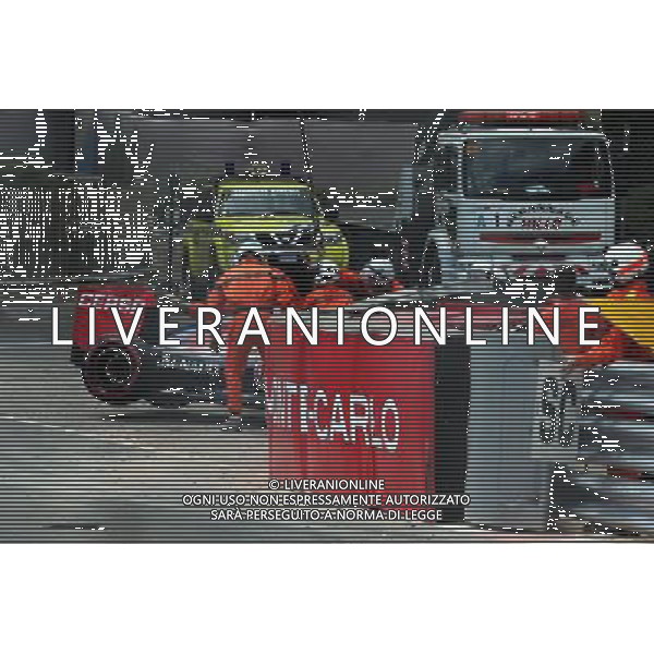 The Red Bull Racing RB11 of Max Verstappen (NLD) Scuderia Toro Rosso is craned away after he crashed out of the race. 24.05.2015. Formula 1 World Championship, Rd 6, Monaco Grand Prix, Monte Carlo, Monaco, Race Day. AG ALDO LIVERANI SAS ONLY ITALY