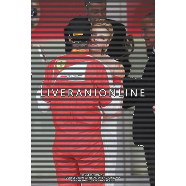 Sebastian Vettel (GER) Ferrari celebrates his second position on the podium. 24.05.2015. Formula 1 World Championship, Rd 6, Monaco Grand Prix, Monte Carlo, Monaco, Race Day. AG ALDO LIVERANI SAS ONLY ITALY