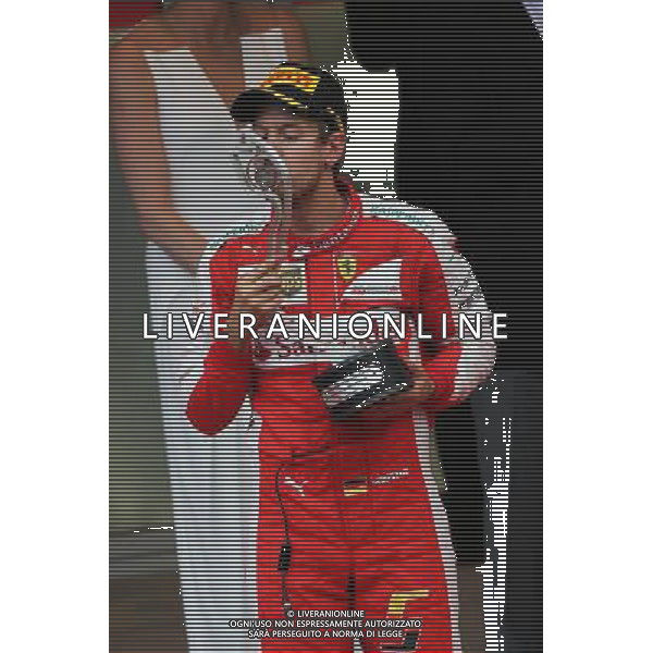 Sebastian Vettel (GER) Ferrari celebrates his second position on the podium. 24.05.2015. Formula 1 World Championship, Rd 6, Monaco Grand Prix, Monte Carlo, Monaco, Race Day. AG ALDO LIVERANI SAS ONLY ITALY