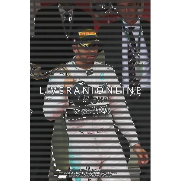 Lewis Hamilton (GBR) Mercedes AMG F1 celebrates his third position on the podium. 24.05.2015. Formula 1 World Championship, Rd 6, Monaco Grand Prix, Monte Carlo, Monaco, Race Day. AG ALDO LIVERANI SAS ONLY ITALY