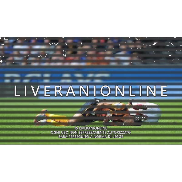 Hull City\'s Ahmed Elmohamady lays on the ground in pain after being caught in a delicate area by Manchester United\'s Angel Di Maria Photographer Chris Vaughan/CameraSport Football - Barclays Premiership - Hull City v Manchester United - Sunday 24th May 2015 - Kingston Communications Stadium - Hull © CameraSport - 43 Linden Ave. Countesthorpe. Leicester. England. LE8 5PG - Tel: +44 (0) 116 277 4147 - admin@camerasport.com - www.camerasport.com AG ALDO LIVERANI SAS ONLY ITALY