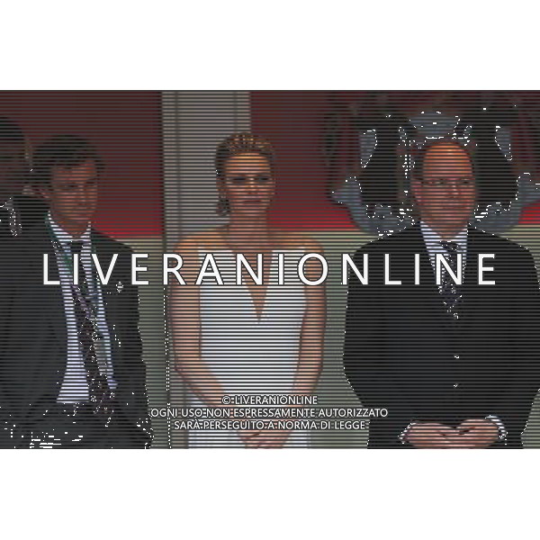 HSH Prince Albert of Monaco (MON) with his wife Princess Charlene of Monaco on the podium. 24.05.2015. Formula 1 World Championship, Rd 6, Monaco Grand Prix, Monte Carlo, Monaco, Race Day. AG ALDO LIVERANI SAS ONLY ITALY