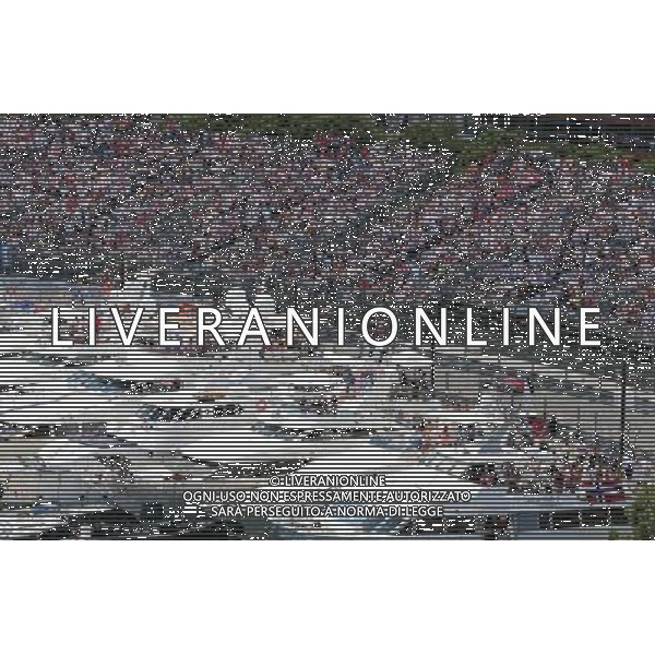 Boats in the scenic Monaco Harbour passed by Daniil Kvyat (RUS) Red Bull Racing RB11. 24.05.2015. Formula 1 World Championship, Rd 6, Monaco Grand Prix, Monte Carlo, Monaco, Race Day. AG ALDO LIVERANI SAS ONLY ITALY