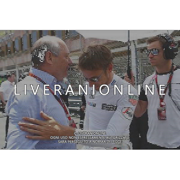 (L to R): Ron Dennis (GBR) McLaren Executive Chairman with Jenson Button (GBR) McLaren and Mike Collier (GBR) Personal Trainer of Jenson Button (GBR) McLaren on the grid. 24.05.2015. Formula 1 World Championship, Rd 6, Monaco Grand Prix, Monte Carlo, Monaco, Race Day. AG ALDO LIVERANI SAS ONLY ITALY