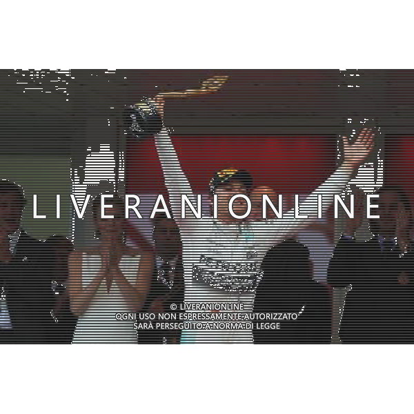 Race winner Nico Rosberg (GER) Mercedes AMG F1 celebrates on the podium. 24.05.2015. Formula 1 World Championship, Rd 6, Monaco Grand Prix, Monte Carlo, Monaco, Race Day. AG ALDO LIVERANI SAS ONLY ITALY