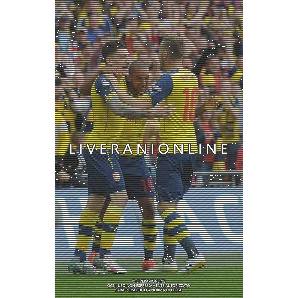 CELE - Arsenal\'s Theo Walcott celebrates scoring the opening goal Photographer Ashley Crowden/CameraSport Football - The FA Cup Final - Aston Villa v Arsenal - Saturday 30th May 2015 - Wembley - London © CameraSport - 43 Linden Ave. Countesthorpe. Leicester. England. LE8 5PG - Tel: +44 (0) 116 277 4147 - admin@camerasport.com - www.camerasport.com AG ALDO LIVERANI SAS ONLY ITALY