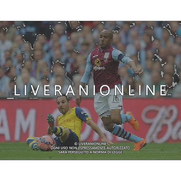 Arsenal\'s Santi Cazorla vies for possession with Aston Villa\'s Fabian Delph Photographer Ashley Crowden/CameraSport Football - The FA Cup Final - Aston Villa v Arsenal - Saturday 30th May 2015 - Wembley - London © CameraSport - 43 Linden Ave. Countesthorpe. Leicester. England. LE8 5PG - Tel: +44 (0) 116 277 4147 - admin@camerasport.com - www.camerasport.com AG ALDO LIVERANI SAS ONLY ITALY